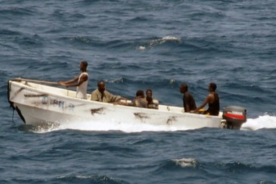 Pirates transiting from MV Faina to shore.