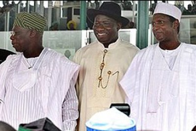 Former president Umaru YarAdua, right, with his predecessor, Olusegun Obasanjo, left, and successor President Goodluck Jonathan in May 2009.