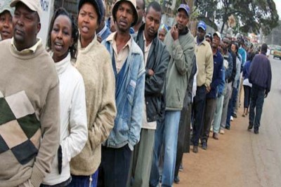 Kenyans patiently wait for their turn to vote at a polling station (file photo).