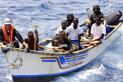 Marines from NATO's Portuguese frigate Corte-Real arrest suspected pirates on their skiff in the Gulf of Aden (file photo).