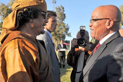 President Jacob Zuma and Libyan leader Muammar Gaddafi during a visit to discuss the coutry's political situation.
