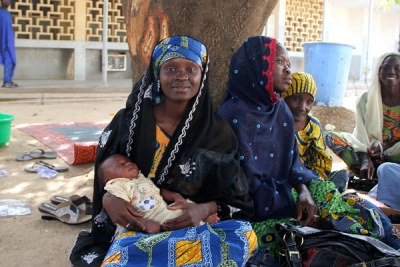A mothern and newborn at the Murtala Mohammed Specialist Hospital in Kano.