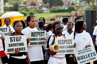 Women subscribing to the Uganda women's civil society organizations hold screaming placards (file photo).