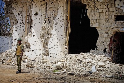 Soldier on patrol along the frontline between AMISOM forces and Al Shabab militia in Mogadishu, Somalia.