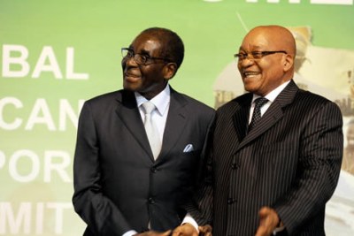 President Jacob Zuma welcomed President Robert Mugabe of Zimbabwe (file photo).