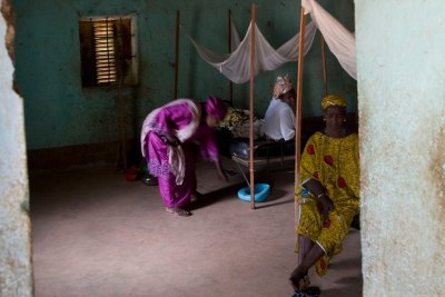 Female patients and medical workers in the maternity section at a community health centre in Mali.