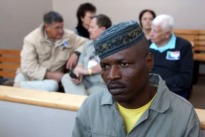Chris Mahlangu, a Zimbabwean national, is seen in court during sentencing proceedings for killing Eugene Terreblanche on his farm in April 2010.