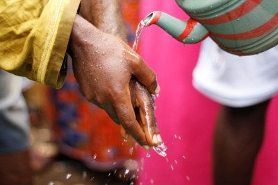 A man washes his hands during cholera prevention session (file photo).