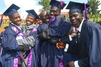 New university graduates celebrate their accomplishment in Uganda.