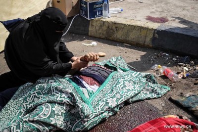 An Egyptian woman mourns a dead protester (file photo).