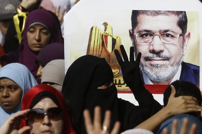 Supporters of ousted Egyptian President Mohamed Mursi take part in a protest against the military (file photo).