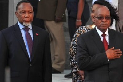 President Jacob Zuma and then Deputy President Kgalema Motlanthe observe the national salute outside the National Assembly in Parliament. (file photo)