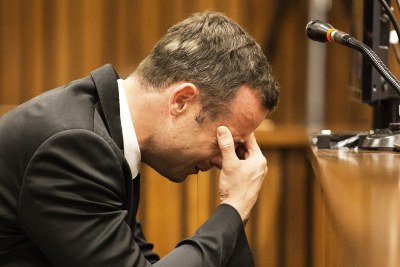 South African Paralympic athlete Oscar Pistorius cries in the Pretoria High Court (file photo).