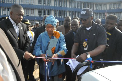 President Sirleaf and Director of Police, Clarence Massaquoi(file photo)