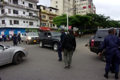 Police officers patrolling central Monrovia.