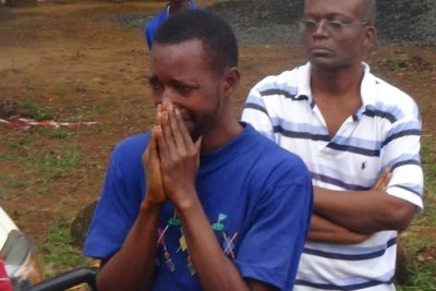 An Ebola survivor breaks down in tears.