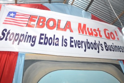 A banner depicting the campaign theme - Ebola Must Go - Ebola is Everybody's Business.