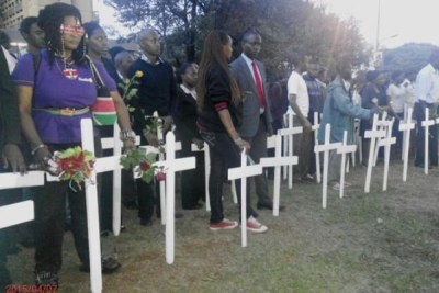 Hundreds attend vigil at Uhuru Park to mourn 147 students killed in Garissa terror attack.