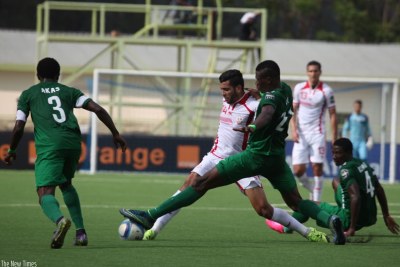 2016 Rwanda CHAN: Tunisia midfielder Muhamed Ben Amor battles with Nigeria defender Stephen Eze at Kigali Regional Stadium.