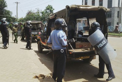 Police arrive at Chuka University to quell students who rioted following a disputed election.
