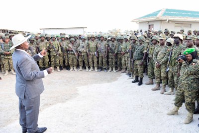 President Museveni addresses UPDF soldiers at the Amisom Halane Base Camp near Mogadishu International Airport in Somalia on.