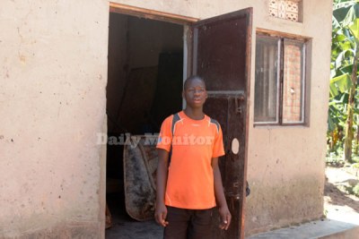 Hard work: Nicholas Luwuge at the entrance to his house in Kalangala. Photo by