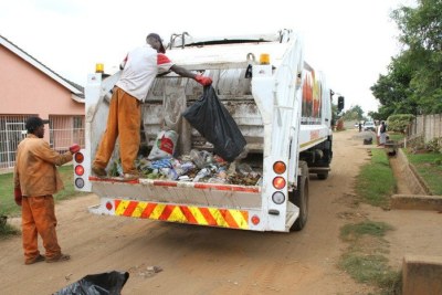 Harare City Council workers collecting garbage in residential areas (file photo).