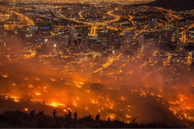 Firefighters battle the wildfire on Signal Hill in Cape Town.