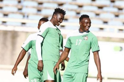 Harambee Stars' striker Michael Olunga (centre) and captain Victor Wanyama (right) during a training session at Safaricom Stadium Kasarani (file photo)