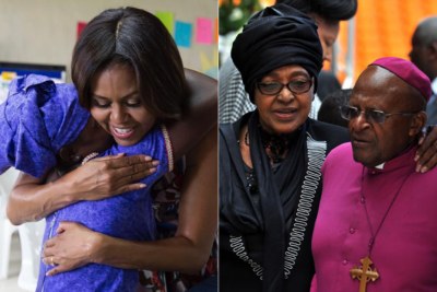 Former U.S. first lady Michelle Obama and former South African first lady Winnie Madikizela-Mandela.
