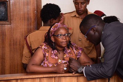 Stella Nyanzi with her lawyer Nicholas Opiyo.