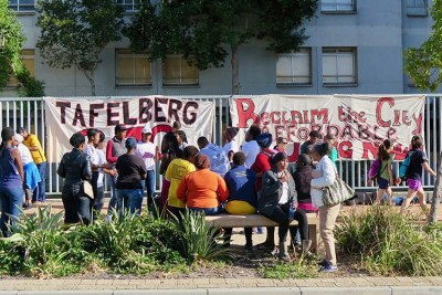 Protesters demonstrate against the decision not to use the Tafelberg school site for affordable housing.