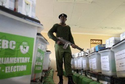A policeman guards ballot boxes (file photo).