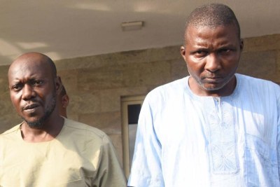 Alleged suspects, Baale of Shangisha, Chief Yusuf Ogundare (right), with his brother and accomplice, Mohammed Adams (left), being paraded during a press briefing at the Lagos House, Ikeja.