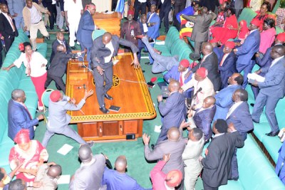 A scene in Parliament after Speaker Rebecca Kadaga suspended 25 MPs including the State Minister for Water Ronald Kibuule.