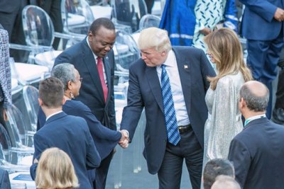 President Trump greets Kenya's First Lady Margaret Kenyatta at the 43rd G7 Summit in Italy.
