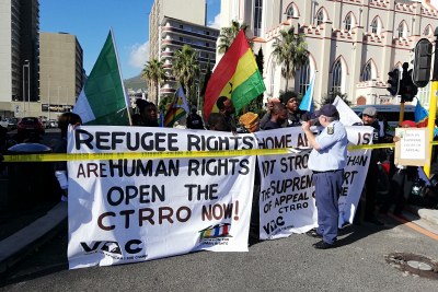 Refugees marched outside Parliament in Cape Town on International Refugee Day.