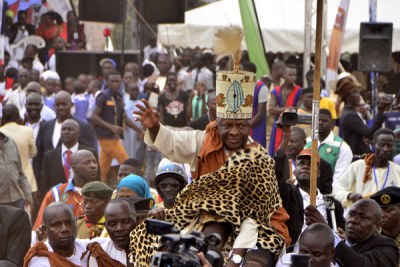 Loyalists carry Kabaka Ronald Muwenda Mutebi II shoulder-high to the rostrum during his silver jubilee anniversary of his coronation in Mengo, Kampala.