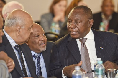 Mcebisi Jonas, centre, seen consulting with President Cyril Ramaphosa, right, and former finance minister Pravin Gordhan in 2016, says South Africa can again prove to the world its  resilience and resolve.