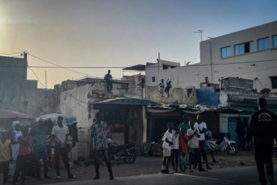 People gather outside Mame Abdou Aziz Sy Dabakh Hospital in Tivaouane, Senegal where 11 newborns died in a fire on May 25, 2022.